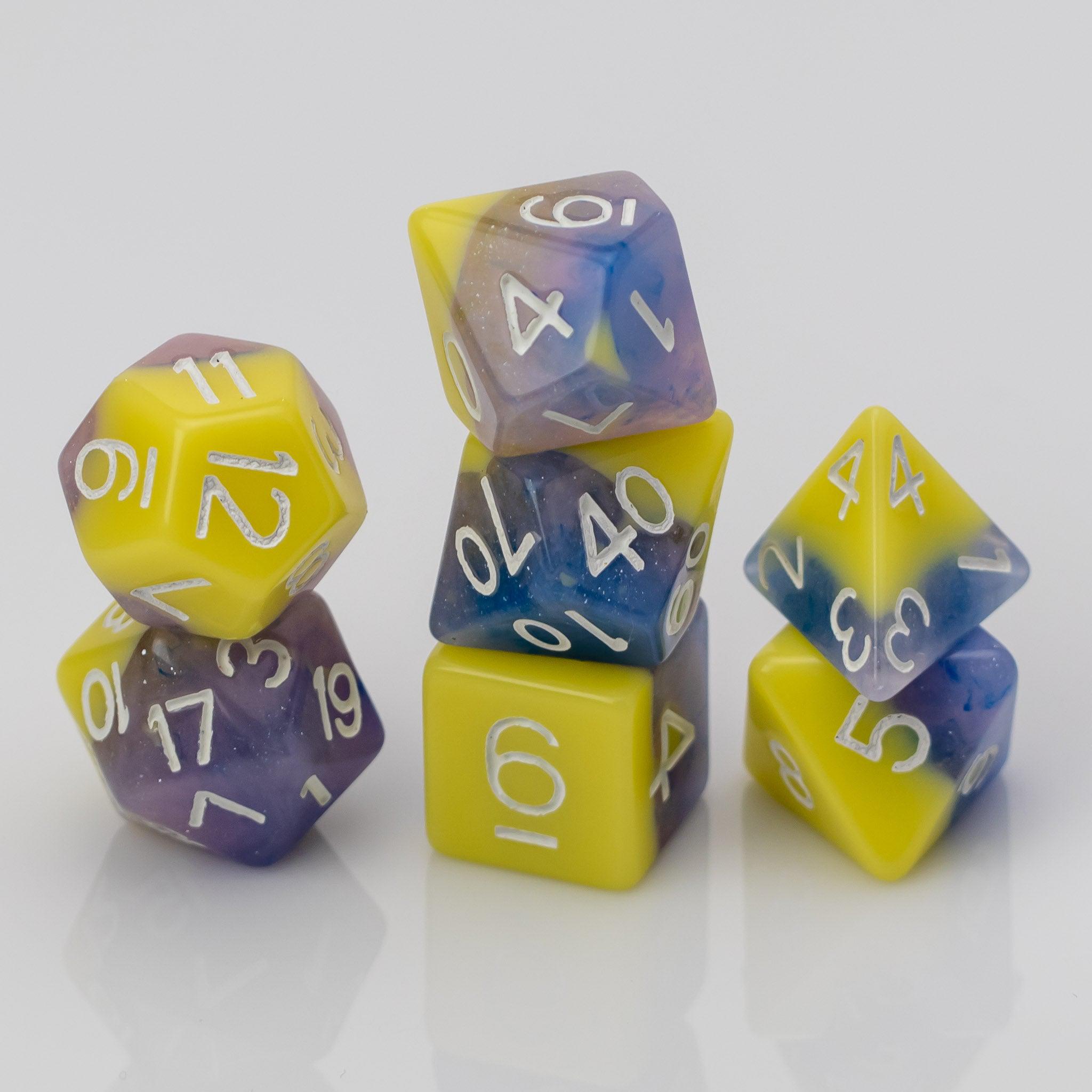Cottton Candy, mulitcolored resin RPG dice 7 piece set stacked.