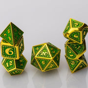 Dragon Scale, green and gold metal DND dice set stacked on a white background.