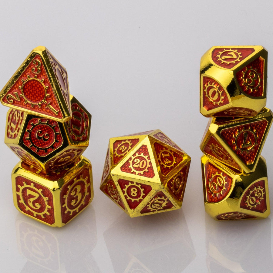 Golden Sun, red and gold metal RPG dice set stacked on a white background.