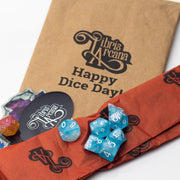 Libris Arcana Monthly RPG Dice Subscription laid out on a white background.