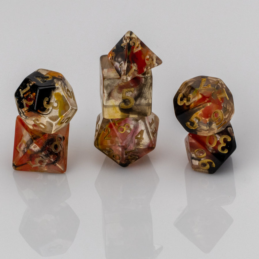 Fire Eye, resin DND dice set, 7 pieces, stacked.