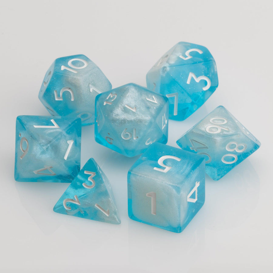 Winter's Breath, frosted blue and white  7 piece RPG dice set on a white background.