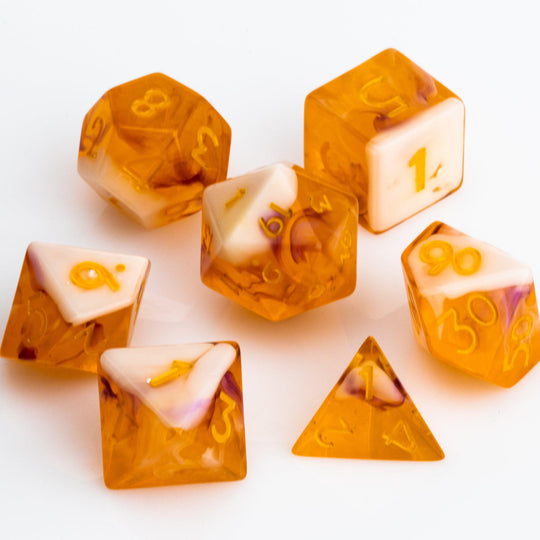 Autumn Spirit, trunslucent orange resin with swriling lavender and opaque cream. 7 piece RPG dice set on white background.