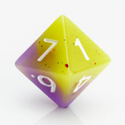 Cupcakes yellow & purple 7 piece RPG dice set D8 on a white background.