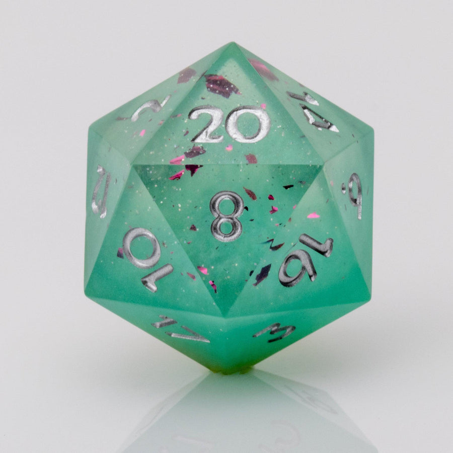 Mojito, green sharp edeged handmade resin DND dice D20 on white background.