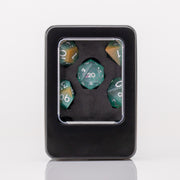 Mojito, green handmade resin DND dice set in decorative tin on white background.