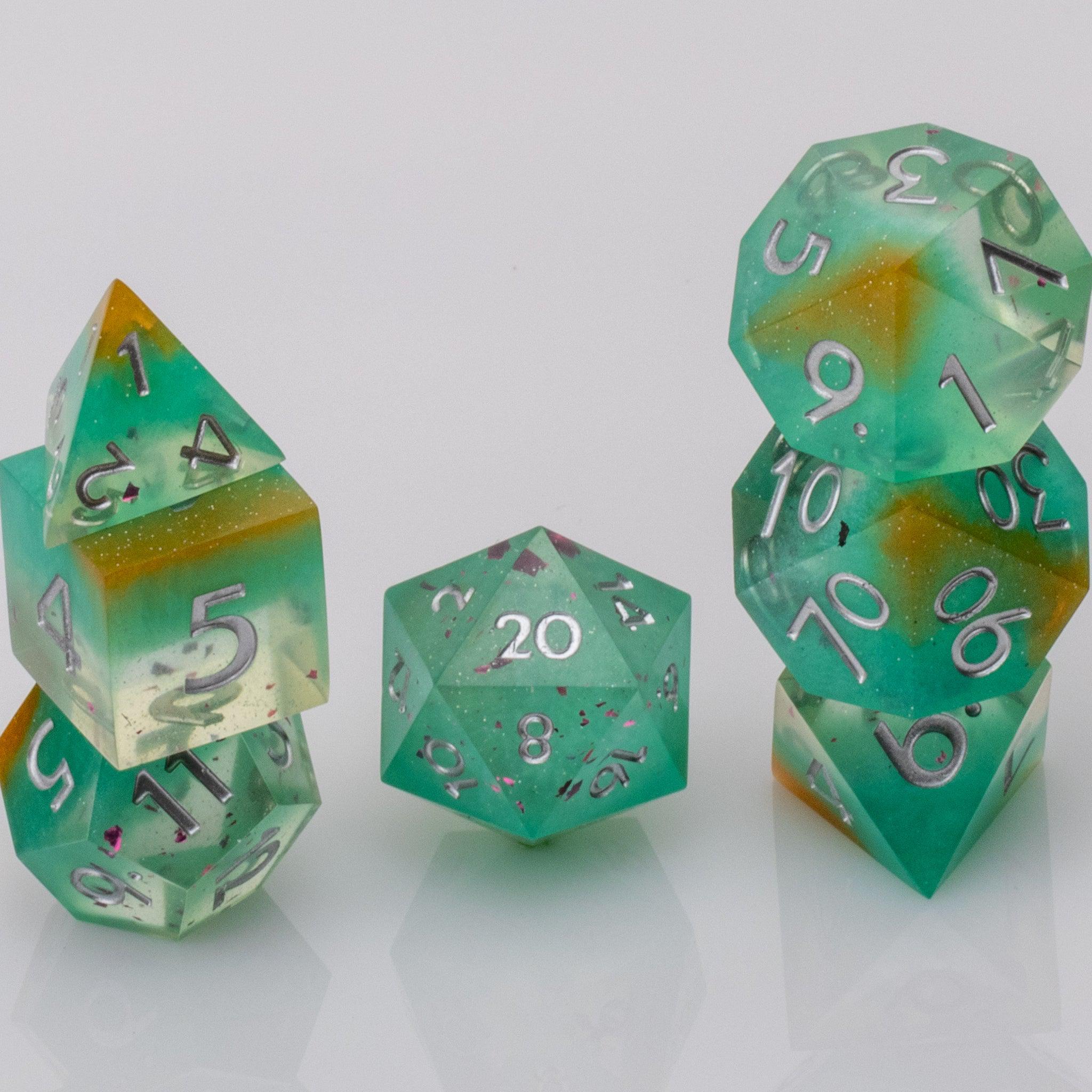 Mojito, green handmade resin DND dice set on white background.