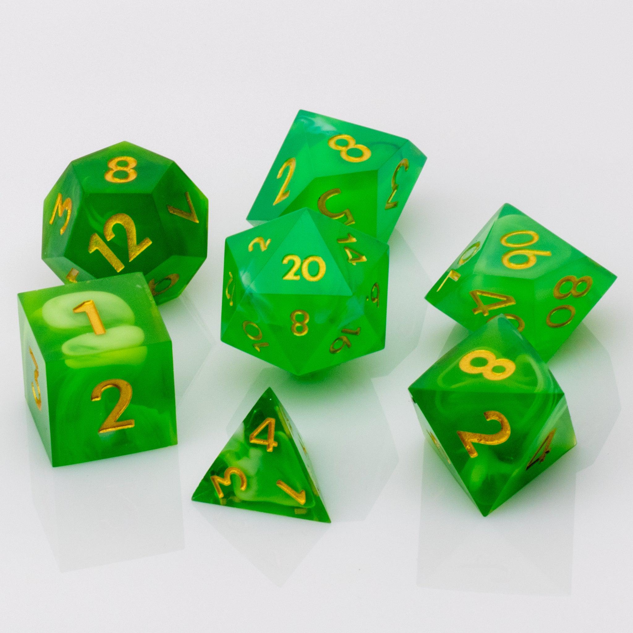Nirvana, swirling green handmade RPG dice set on a white background.