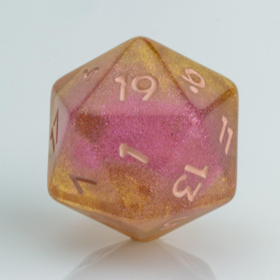 Pamplemousse, pink & orange gold D20 on a white background.