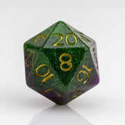 Perseid--Green and purple RPG dice with with swirled, glittery inclusions and gold metallic inking. D20 on white background.