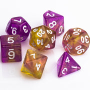 Rainbow Sherbet, purple and yellow gold translucent RPG dice with wite inking. 7 piece RPG dice set on white background.