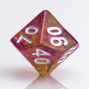 Rainbow Sherbet, purple and yellow gold translucent RPG dice with wite inking. 7 piece RPG dice set D00 on white background.
