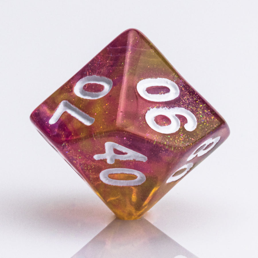 Rainbow Sherbet, purple and yellow gold translucent RPG dice with wite inking. 7 piece RPG dice set D00 on white background.