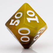 Scorch, yellow, brown and black resin DND dice 7 piece set D00 on white background.