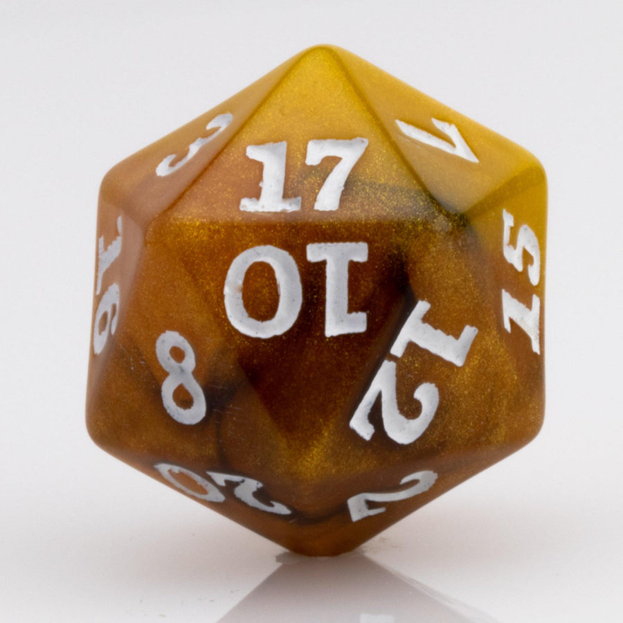 Scorch, yellow, brown and black resin DND dice 7 piece set D20 on white background.