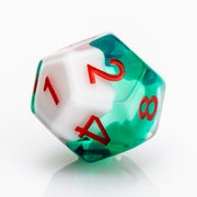 Shillelagh, white, green, and red D12 on a white background.