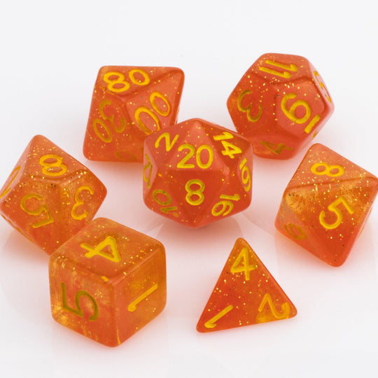 Snow Taffy, transulcent orange resin RPG dice 7 piece set on white background.