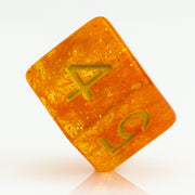 Snow Taffy, transulcent orange resin RPG dice 7 piece set D6 on white background.