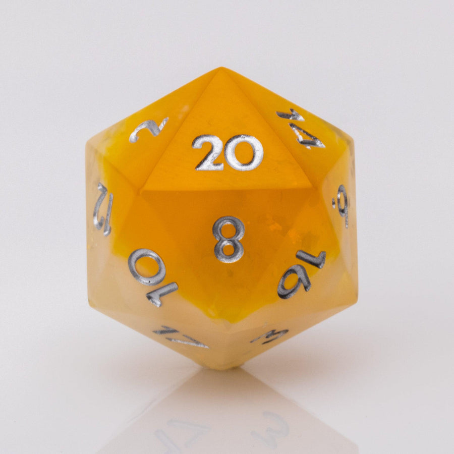 Sundown, swirling orange and white handmade RPG dice D20 on a white background.